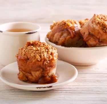 Caramel Apple Muffins on a table with coffee