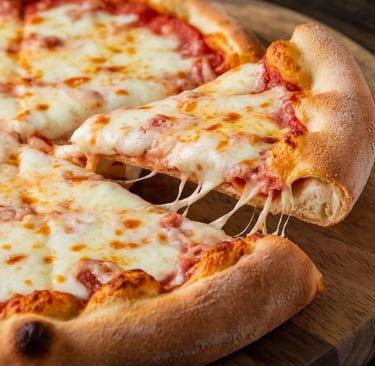 Cheese-Stuffed Crust Pizza with visible cheese pulling from the thick, golden-brown crust. 