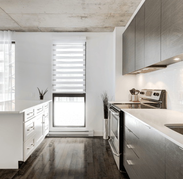 a kitchen with a sink and a counter top