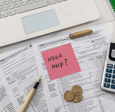 a calculator and a calculator with a notepad and pen