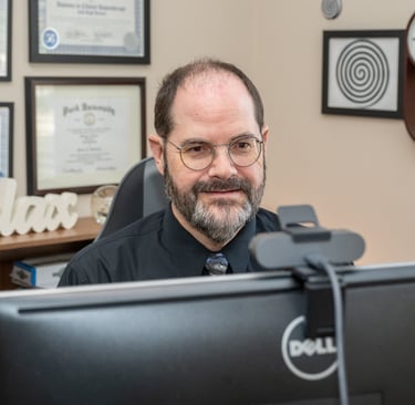 a man in a black shirt and tie dye dye dye dye dye dye dye dye