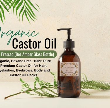 a bottle of castor oil with a green leafy branch