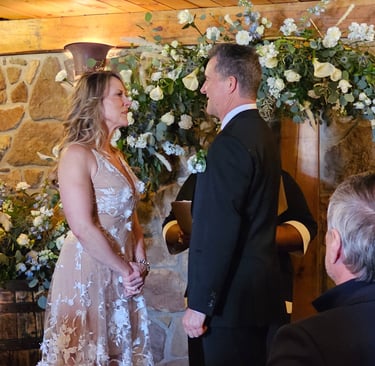 a man and woman getting married in a wedding ceremony