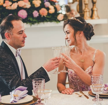 a man and woman are sitting at a table