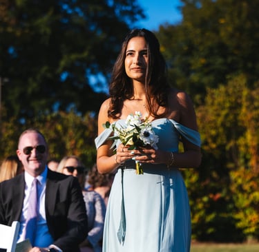 Bride's Maid Holding bouquet