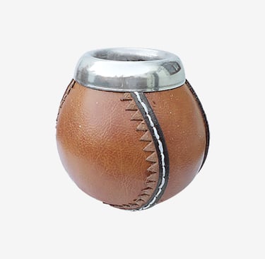 Traditional Argentine leather-wrapped mate gourd with a polished metal rim and hand-stitched details.