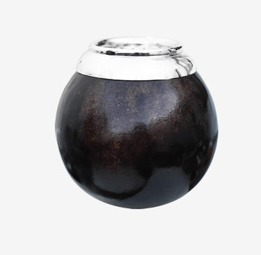 Traditional dark leather yerba mate gourd with a polished silver rim for drinking tea.