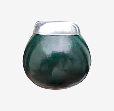 Polished green marble yerba mate gourd with a stainless steel rim against a plain white background.