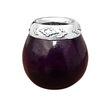 Handcrafted purple yerba mate gourd with a decorative silver rim and traditional patterns.