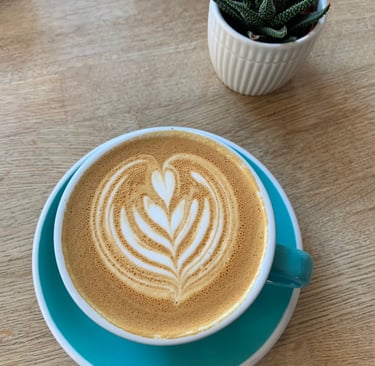 flat white with barista art