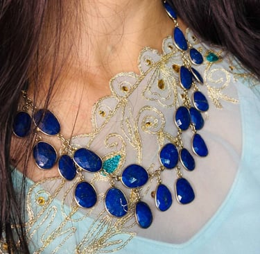 a woman wearing a Lapis Lazuli Necklace