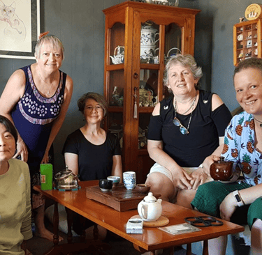 Australian rural women enjoying a Chinese and Japanese tea-sampling party at home