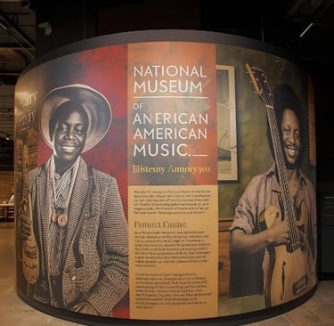 a large display of a man in a hat and a guitar