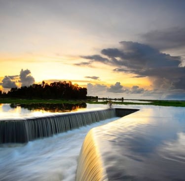 afsluitdijk - a waterfall in the middle of a river