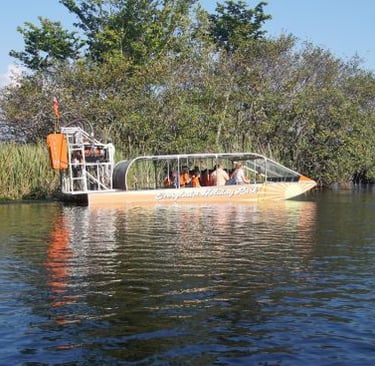 a boat with people in a boat on the water