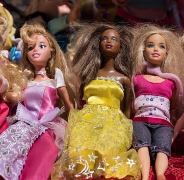 a group of dolls sitting on a table