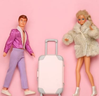 a couple of dolls are standing next to each other