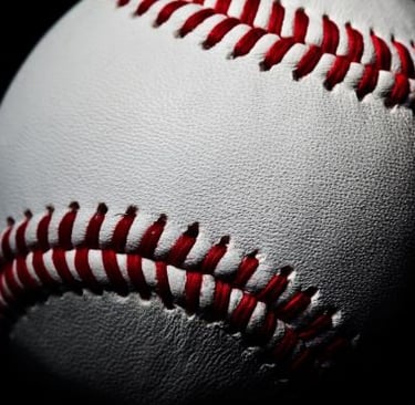 a baseball ball with red stitching on it