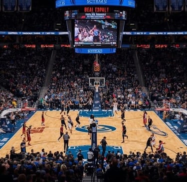 a basketball game with a crowd of people watching a game