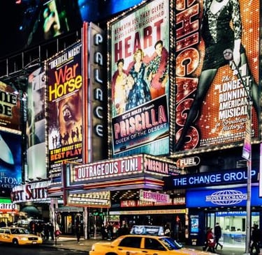 New York - a taxi cab cab driving down a busy street