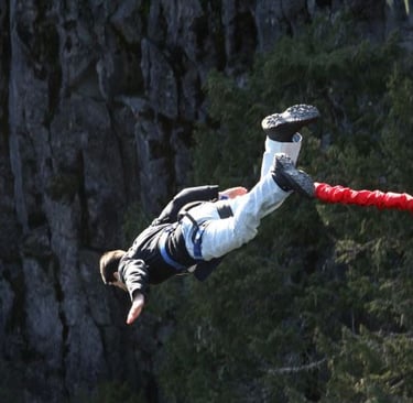 a person is doing a trick on a rope - line