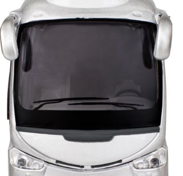 a silver bus with a black face and a black face