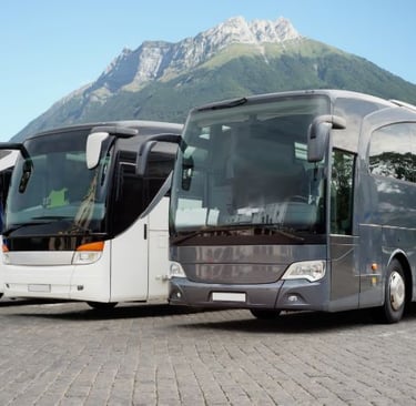 a couple of buses parked next to each other