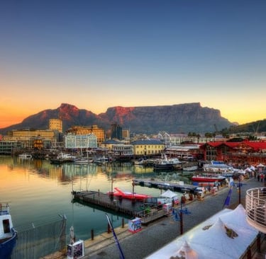 a view of a city at sunset