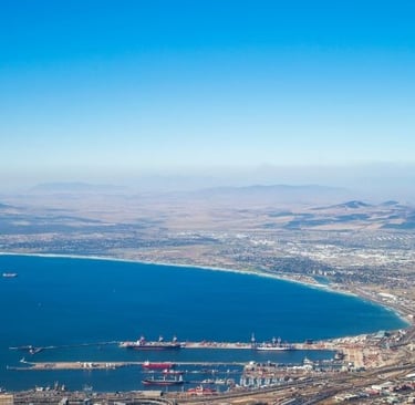 a view of a cape town city with a large body of water