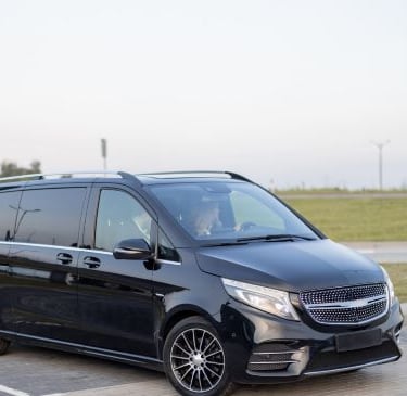 a black van parked in a parking lot