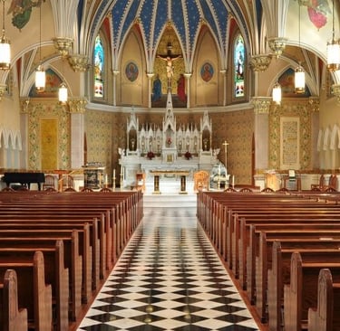 a church with a black and white checkered floor