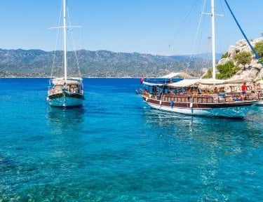 a group of boats in the water