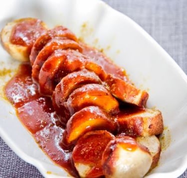 a plate of sausages and sausages on a plate