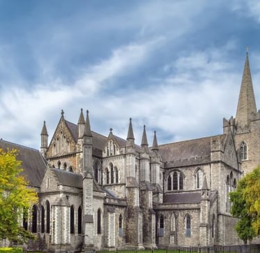 a large cathedral like building with a clock tower
