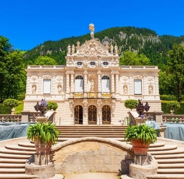 a large castle with a fountain