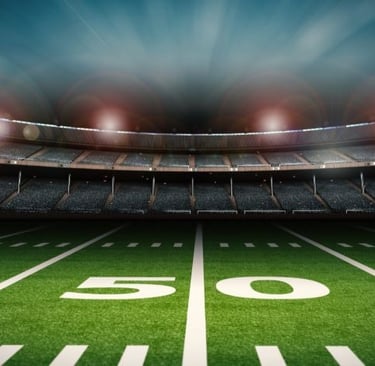 a football field with a stadium stadium full of people