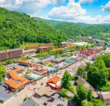 a view of a town with a mountain view