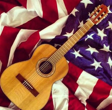 a guitar player's guitar and a guitar