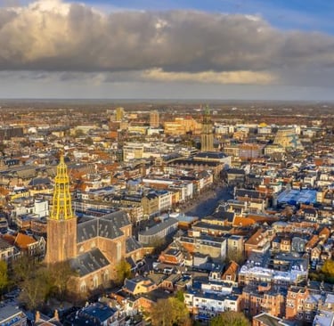 a cityscape of a city with a clock tower