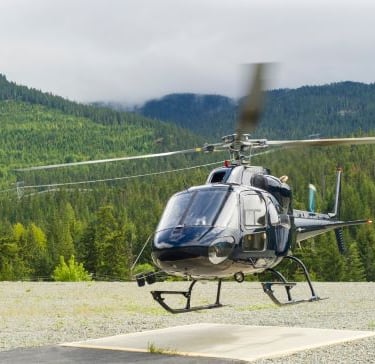 a helicopter that is sitting on a runway