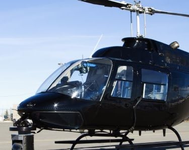 a helicopter that is sitting on a tarmac