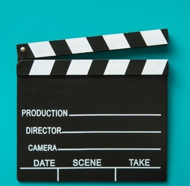 a clap clapper board with a clapper and a movie clapper