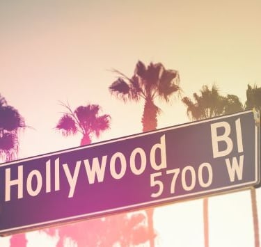 a street sign that says hollywood boulevard