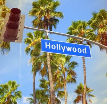 a street sign that says hollywood boulevard