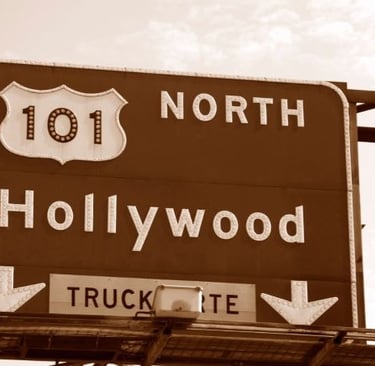 a highway sign for the 101th Hollywood street sign
