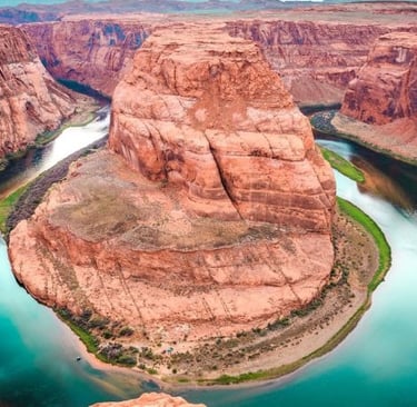a river running through a canyon in the grand canyon