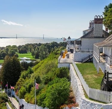 view of an island with see trees and old building structures