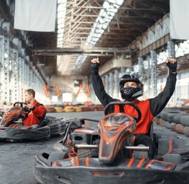 a man in a helmet and go kart