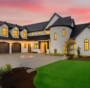 a large house with a large driveway and a driveway