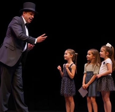 a magician in a suit and tie standing on stage